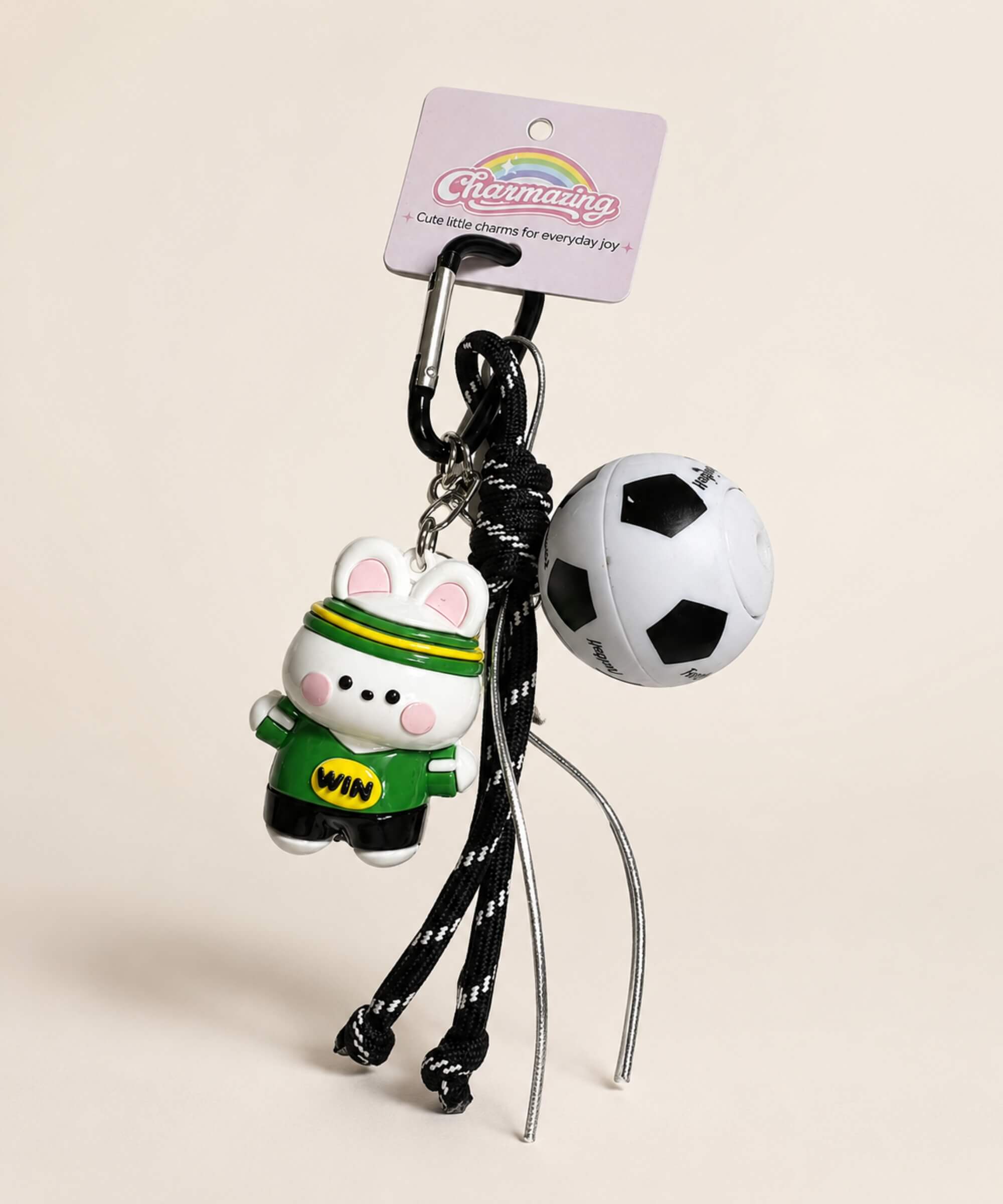 Green team bunny soccer ball spinner keychain with rotating soccer ball detail and rope-style strap